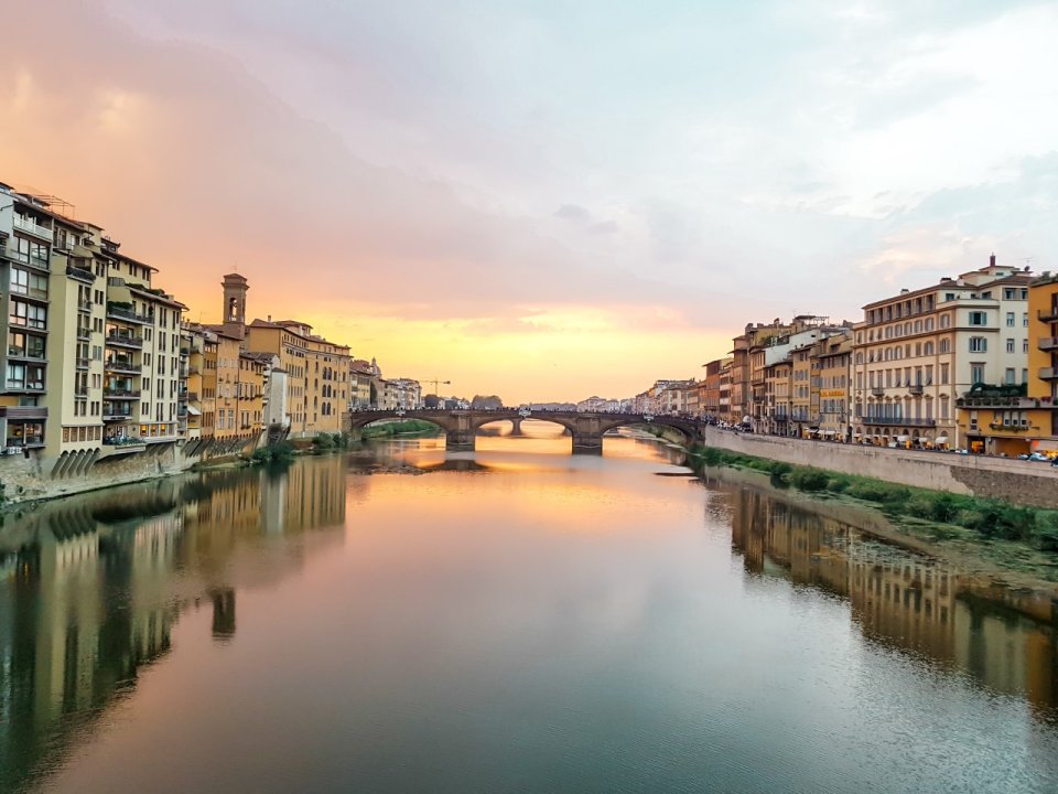 Sunset in Florence with yellow and pink hues